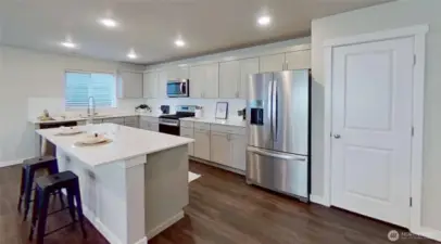 Kitchen. Stainless appliances. Staged.