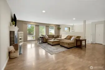 Open concept living makes entertaining a breeze! Plenty of space for guest in this sprawling living room!