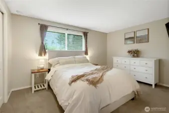 Primary suite offers a spacious layout, a light filled room with a bath en suite!