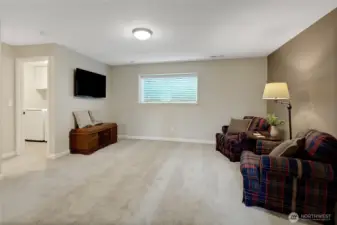 Excellent flex space can be used as a family room, game room, media room, or the perfect fitness area!