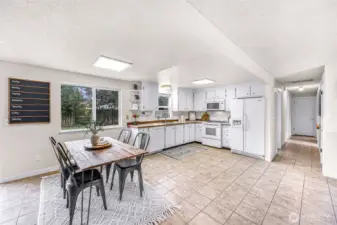 Hall leads to bedrooms and additional storage closet