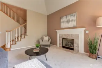 Living/sitting room with 2nd gas fireplace.