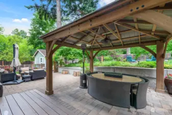 Covered eating area in this incredible back yard!  Gazebo installed in 2017