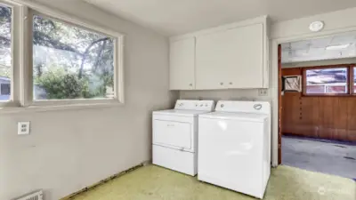 Laundry room and bonus room/extra bedroom to the right.