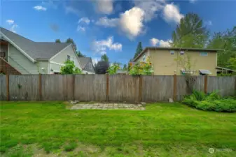 Back Patio View. Partially Fenced Yard