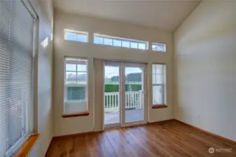 Living room with French Doors to covered back deck.