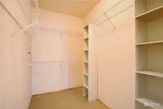 Roomy primary closet with tons of storage