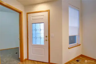 Front entry door and view into office/den