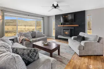 Abundant natural light with fireplace to keep you warm!
