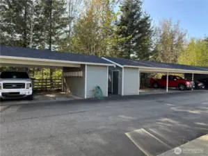 Covered patio parking with storage.