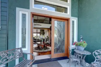 Welcoming double door entry where the local deer come to be fed apples.