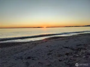 Enjoy incredible sunsets from your custom waterfront home