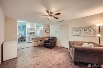 Versatile Flex Space  Just off the kitchen, this adaptable room can serve as a cozy family room, an additional dining area, or a flexible space tailored to your lifestyle needs. The perfect spot to make your own.