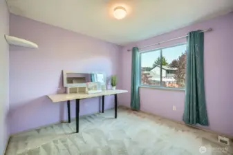 Generously Sized Second Bedroom  This spacious bedroom offers plenty of room for rest, study, or play—ideal for guests or a flexible living space that grows with your needs.