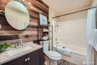 Updated Guest Bathroom  This thoughtfully updated guest bathroom combines modern finishes with practical design, providing a fresh and inviting space for family and visitors alike.