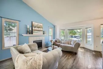 Relax & Entertain in Style  Gather in comfort around the cozy gas fireplace, the heart of this stylish living room. Whether you're hosting guests or enjoying a quiet evening in, this space offers warmth, elegance, and versatility.