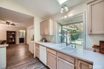 Chef-Inspired Kitchen  Designed for the home chef, this kitchen offers generous counter space and a charming garden window that fills the room with natural light and a touch of nature. Functional and inviting, it’s ready to support your culinary creations.