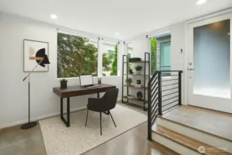 Front Entry directly onto the concrete floors of your Flex Room off the 3rd bedroom and full bathroom!