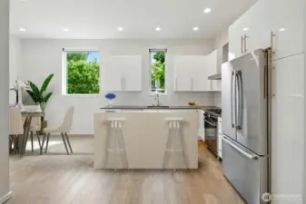 2nd floor living, chef's kitchen and formal dining area!