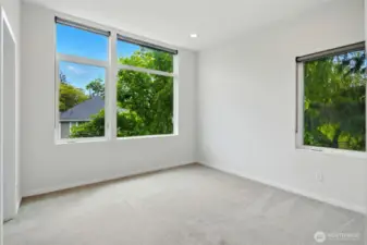 Primary Bedroom w/attached en suite and walk in closet