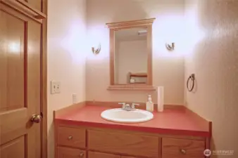 Half bath just off the main entry of the home