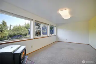 bonus room with wood stove downstairs