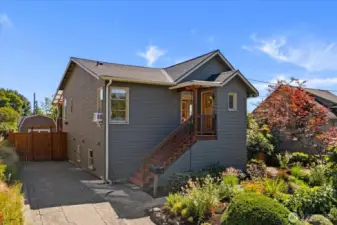 Classic Seattle home steps away from Market Street and perched high overlooking Ballard, Woodland Park and south towards Seattle.