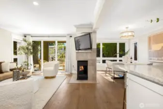 Cozy up by the tiled fireplace or step out through sliding glass doors to your private patio.