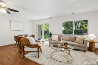 The living area opens to the dining area and kitchen.