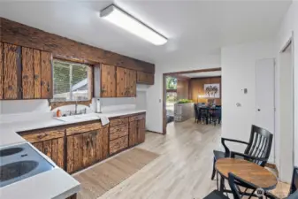 KITCHEN WITH HANDMADE WOOD CABINETS AND TRIM