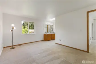 Primary bedroom with new carpet.