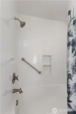 Main bath with new bathtub and surround.