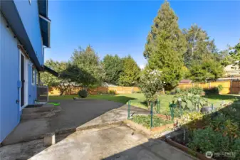 Huge patio located in the private fenced backyard.