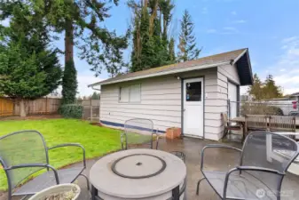 Detached garage with side entry access offers storage, parking, and extra usable space.