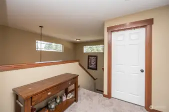 Upstairs to bedrooms and bonus room.  This door is to the laundry room.