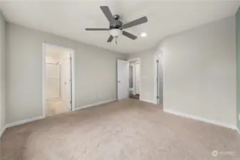 Large primary bedroom with walk-in closet.