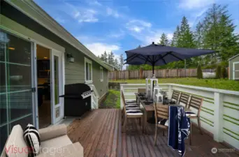 BBQ year around with this deck access right off of the kitchen and dining area.