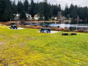 Open and covered picnic areas, complete with BBQ's lakeside, just down around the corner from the house.