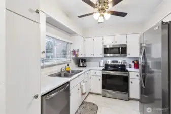 Included stainless steel appliances.