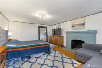 originally a family room... Now being used as a large bedroom with fireplace (non-conforming)