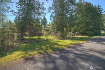 A paved road approaches this beautiful setting.