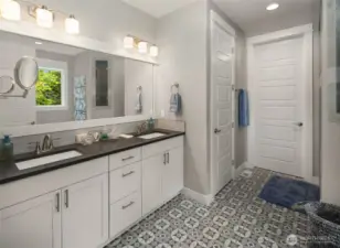 Very spacious primary bath leads to a large walk in closet