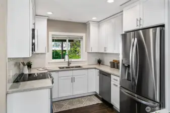 Kitchen is open and has a nice island. Dining room has access to a covered porch. All remodeled in 2018.