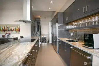 Stainless appliances and an induction cooktop,