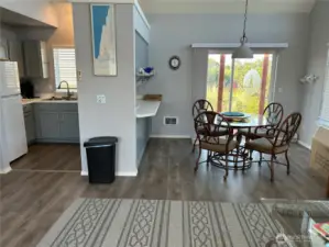 Kitchen and eating area.  All new applicances to include refrigerator, stove, dishwasher, and microwave.  All Frigidaire....