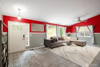Great room concept with vaulted ceiling.