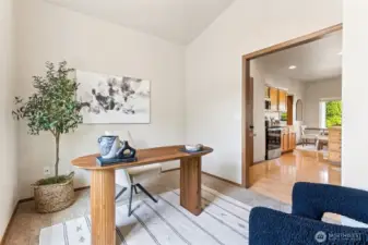 1 of 2 versatile flex rooms. Seen here as a staged office however owners of this home have used this room as a play room, office, den, tv room, library/reading nook, study, game room, movie room and more. Beautiful natural light pours in thru the large window. Wheelchair accesible. Ceiling fan too.