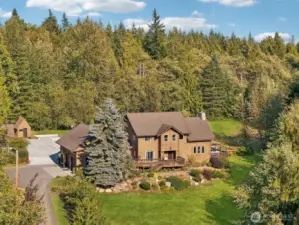 This unique property on 4.72 acres offers a harmonious blend of comfortable living, practical amenities, and a deep connection to nature.