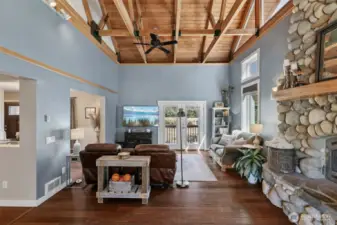 French doors lead you out to a spacious deck, lawn and garden area.