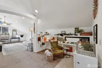 Tucked just off the Wing 2 living room, this cozy study area offers extensive built-in storage and shelving—ideal for both practical organization and creative display.